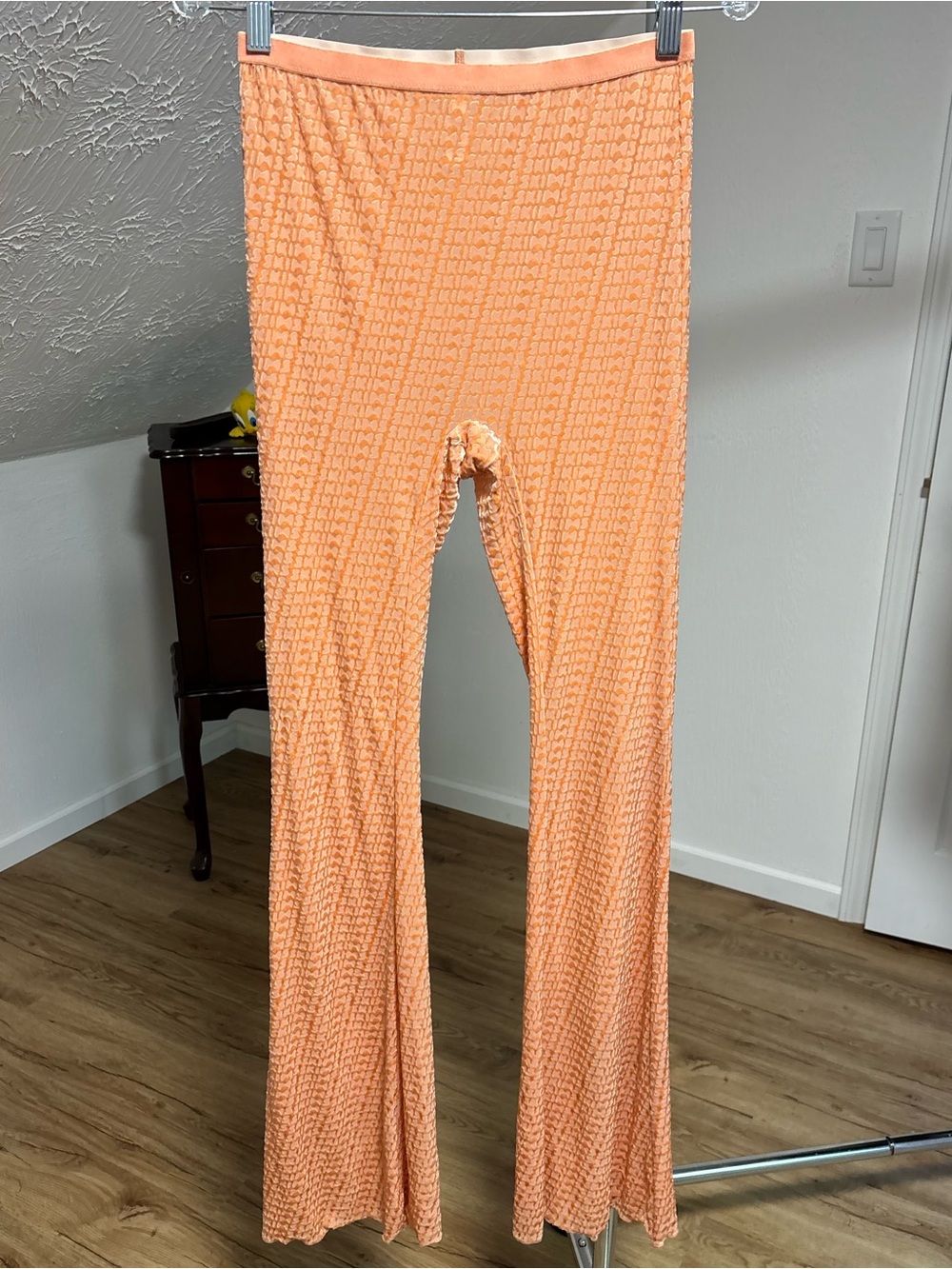 Skims velvet logo flare sheer bottoms, peachy colored loungewear. Size medium